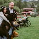 Image for article titled Hero Maid Of Honor Carries Bride's Enormous, Dying Dog Down the Aisle